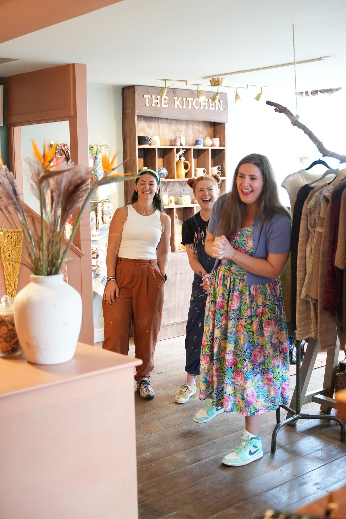 Joyful reactions from store owner Abi
