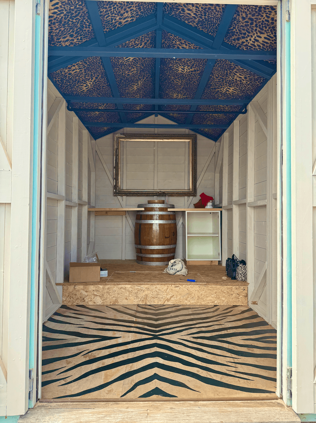 Sophie's beach hut starting to take shape with animal prints and a false floor to create a difference in level.