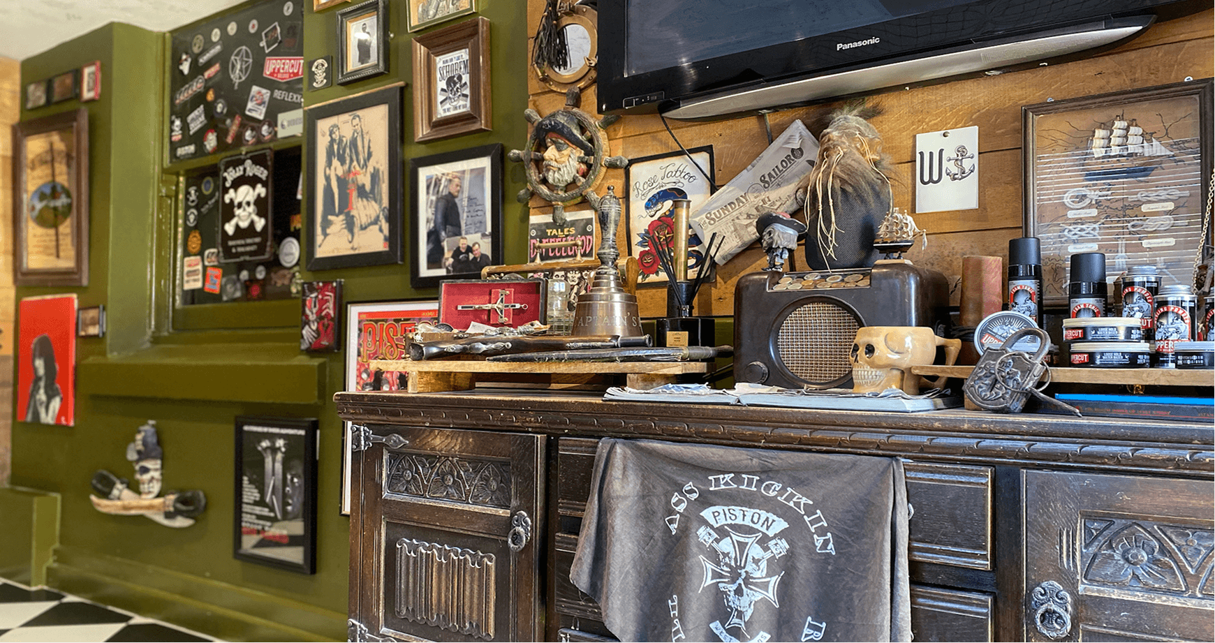 Photo of a pirate barbers workstation decorated with memorabilia and trinkets from times gone by