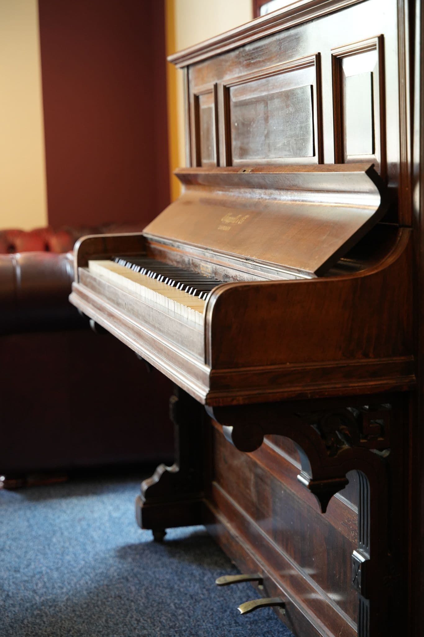A second-hand piano brought in as a nod to the traditional navy music